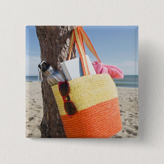 Chapa Cuadrada Bolso que cuelga en tronco de árbol en la playa de (Anverso)
