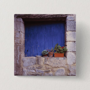 Chapa Cuadrada Europa, Francia, Cereste. Una puerta azul añade co