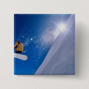 Chapa Cuadrada Hombre volando por el aire en una snowboard con
