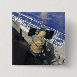 Chapa Cuadrada Los artilleros acoplan encender una ametralladora