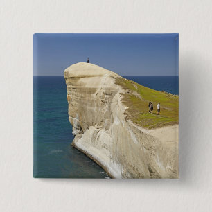 Chapa Cuadrada Tourists on cliff top at Tunnel Beach