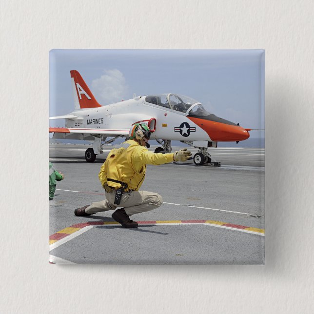 Chapa Cuadrada Un tirador a bordo del portaaviones (Anverso)