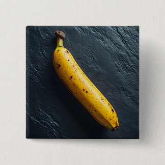 Chapa Cuadrada Una banana en una superficie oscura