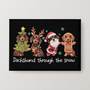 Chapa Dachshund a través de la nieve Perros divertidos d