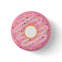 El buñuelo rosado con el arco iris asperja