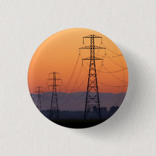 Chapa Redonda De 2,5 Cm Torres de energía al atardecer