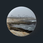 Chapa Redonda De 5 Cm Morro Bay California Coastal Photography<br><div class="desc">A foggy overcast day in Morro Bay California with the ocean waves hitting the rocks on the shore in this beach photograph souvenir. This seaside travel photo keepsake button features black cursive script above the beach rocks and grey sky.</div>