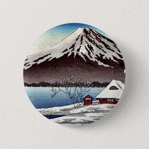 Chapa Redonda De 5 Cm Pequeño edificio nevado en la costa