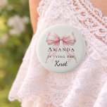 Chapa Redonda De 5 Cm Tying the knot pink bow ivory pearls Bachelorette<br><div class="desc">Celebrate your special milestone with this chic bachelorette party button. The design features a luxurious pink bow adorned with delicate pearl strands. It serves as a stylish accessory for the bride-to-be to wear during her bridal shower or night out with bridesmaids. Ivory background color.</div>