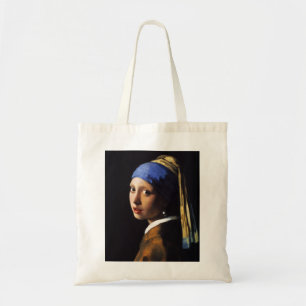 Chica con una bolsa de asas del pendiente de la
