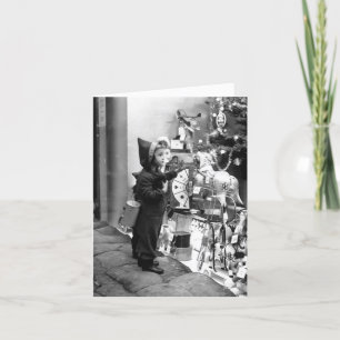 Chica de tarjetas de Navidad y VENTANA TIENDA DE J