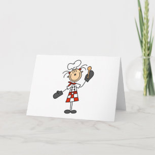 Chica del cocinero con las tarjetas de madera de