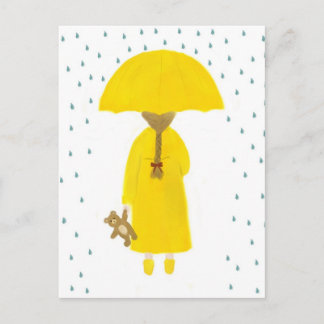 Chica del Día del Lluvia con postal del oso de Ted