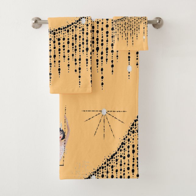 Chica del parachoques sobre el conjunto de toallas (In situ)