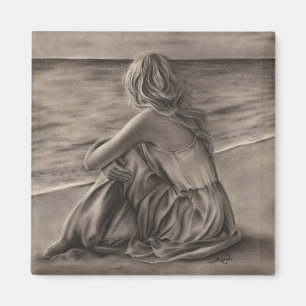 Chica en el imán de la playa