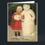 Chica en la Chaqueta Roja con postal navideña<br><div class="desc">Vintage tarjeta navideña de Chica con abrigo rojo que protege a Snowman con un paraguas verde.</div>