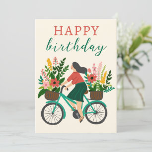 Chica lindo en bicicleta con flores feliz cumpleañ