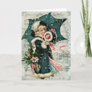 Chica vintage de tarjetas de Navidad con paraguas