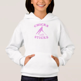 Chicas de ringette con una camiseta de garrapatas