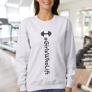 chicas que levantan sudadera de Dumbbell