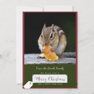 Chipmunk con una tarjeta de Navidades de mandarín