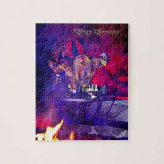 Chris Caffery Jester con el rompecabezas del table