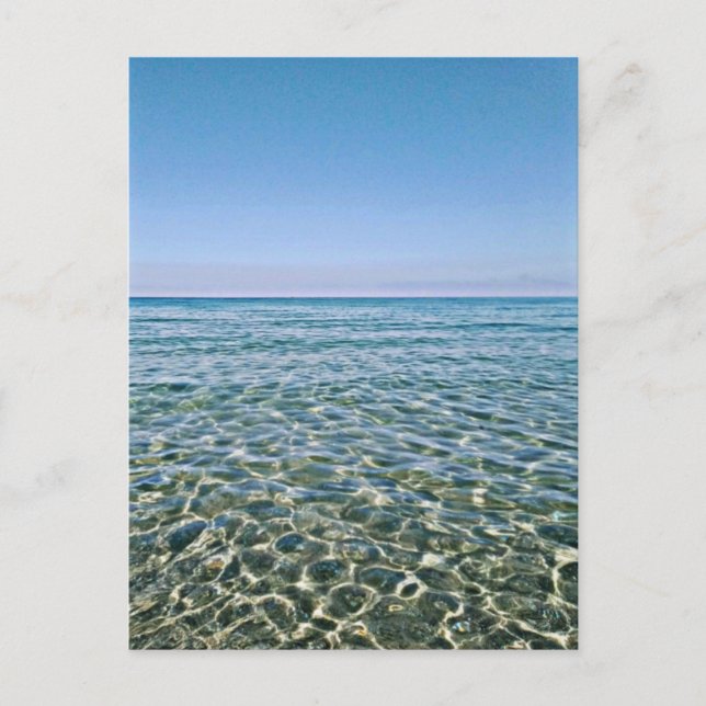 Cielo azul y hermosa postal del mar tranquilo (Anverso)