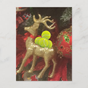 Ciervos del navidad con las pelotas de tenis