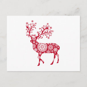 Ciervos rojos del navidad con los copos de nieve