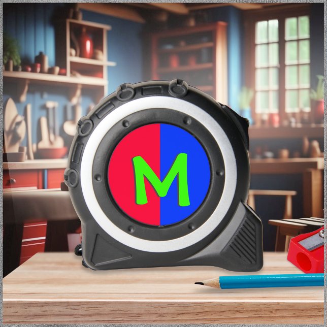 Cinta Métrica Medición personalizada de un monograma brillante d (A monogrammed tape measure, with bright, colorful and simple design in red, blue and lime green)