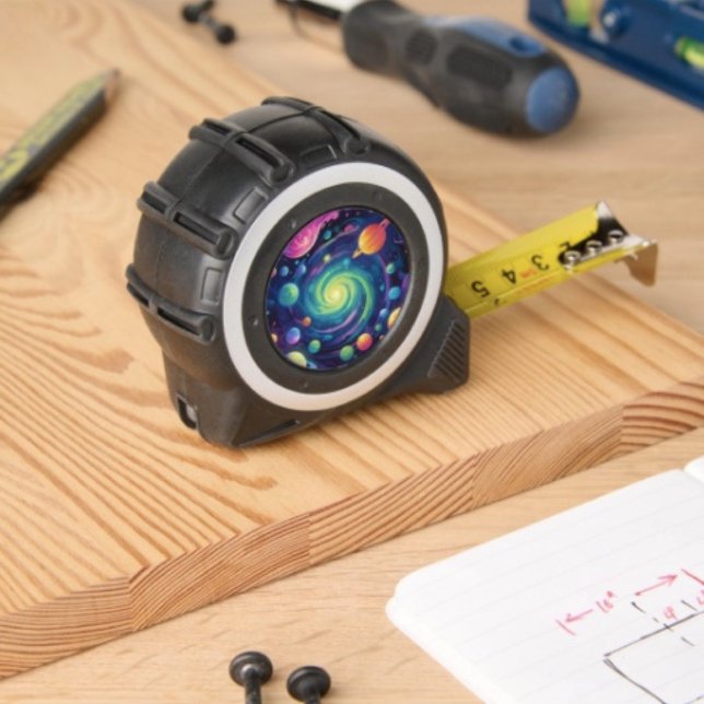 Cinta Métrica Rotación Planetaria  (Galaxy Tape Measure – inches on one side with metrics on the other.  Clip plastic /rubber. 
)