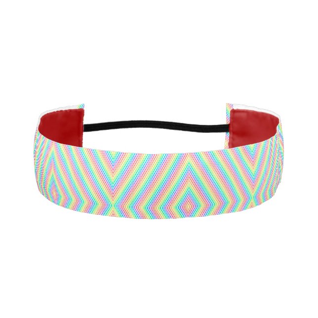 Cinta Para La Cabeza A headband with a vibrant geometric zigzag pattern (Anverso)