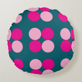 Círculos rosados en cojín redondo verde