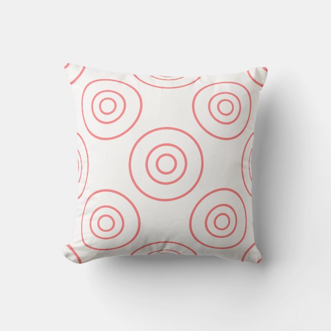 Círculos rosados sobre una almohada blanca (Anverso)