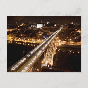 Ciudad de Oporto por noche postal