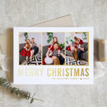 Clásica tipografía Collage de fotos Feliz Navidad<br><div class="desc">Feliz Navidad! Envíe sus cálidos deseos esta temporada con esta tarjeta de collage de fotos de los Navidades de personalizable. Presenta una tipografía simple. Personalice agregando tres fotos, nombres, año y otros detalles. Esta moderna tarjeta de Navidades de Relieve metalizado dorado está disponible en otros colores y material de cartón....</div>
