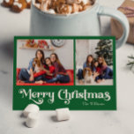 Clásico Simple Verde Feliz Navidad Dos Fotos<br><div class="desc">Celebre la temporada con esta única y clásica tarjeta postal de vacaciones verde Feliz Navidad con un toque de encanto vintage. El diseño minimalista muestra una elegante paleta de colores verdes que evoca el acogedor espíritu del invierno. Su atractivo moderno y divertido, junto con la redacción tradicional, crea un equilibrio...</div>