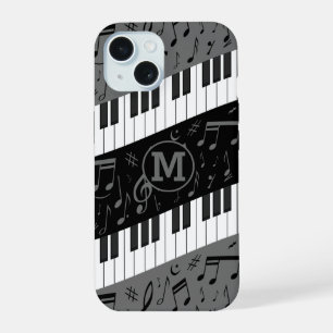 Claves de piano en curva monogramadas y notas musi