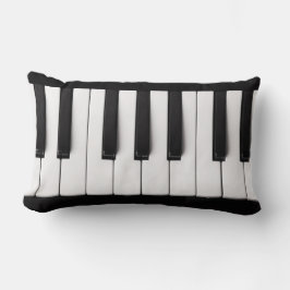 Claves de piano lanzan almohadas