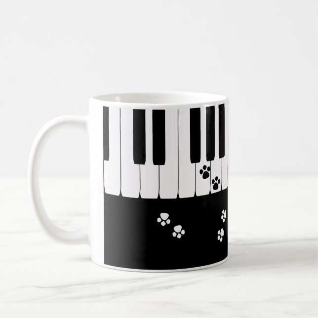 Claves de piano y pies de gato paño taza de café (Izquierda)