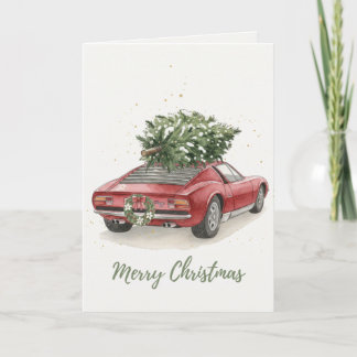 Coche deportivo rojo vintage con tarjeta de árbol 