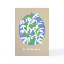 Cojetas de nieve blancas en la tarjeta de cumpleañ