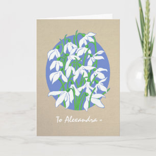 Cojetas de nieve blancas en la tarjeta de cumpleañ