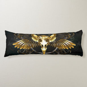 Cojín Cráneo de pájaro dorado sobre fondo negro