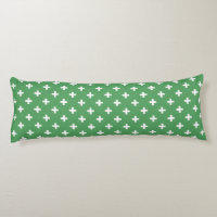 Cruces de polka blanco sobre verde