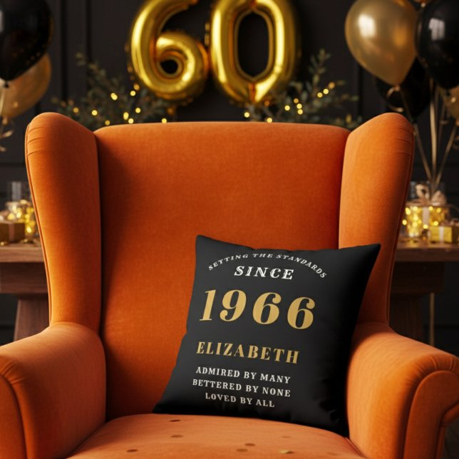 Cojín Decorativo 60th Birthday Gift Personalized 1966 Black Gold (A personalized black pillow on a vibrant orange velvet wingback armchair )