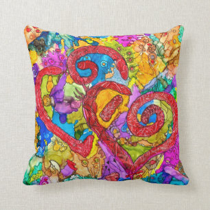 Cojín decorativo abstracto y colorido del corazón
