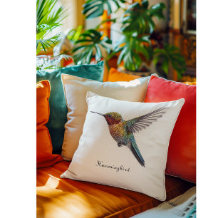 Cojín Decorativo Alas de Arcoíris: Arte Vibrante de Colibrí