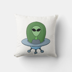 Cojín Decorativo Alien en su pequeña nave espacial