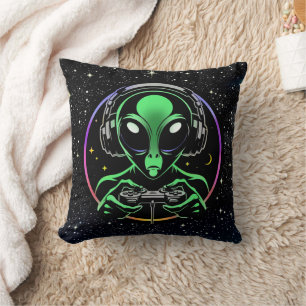 Cojín Decorativo Alien jugando videojuegos con fondo estelar